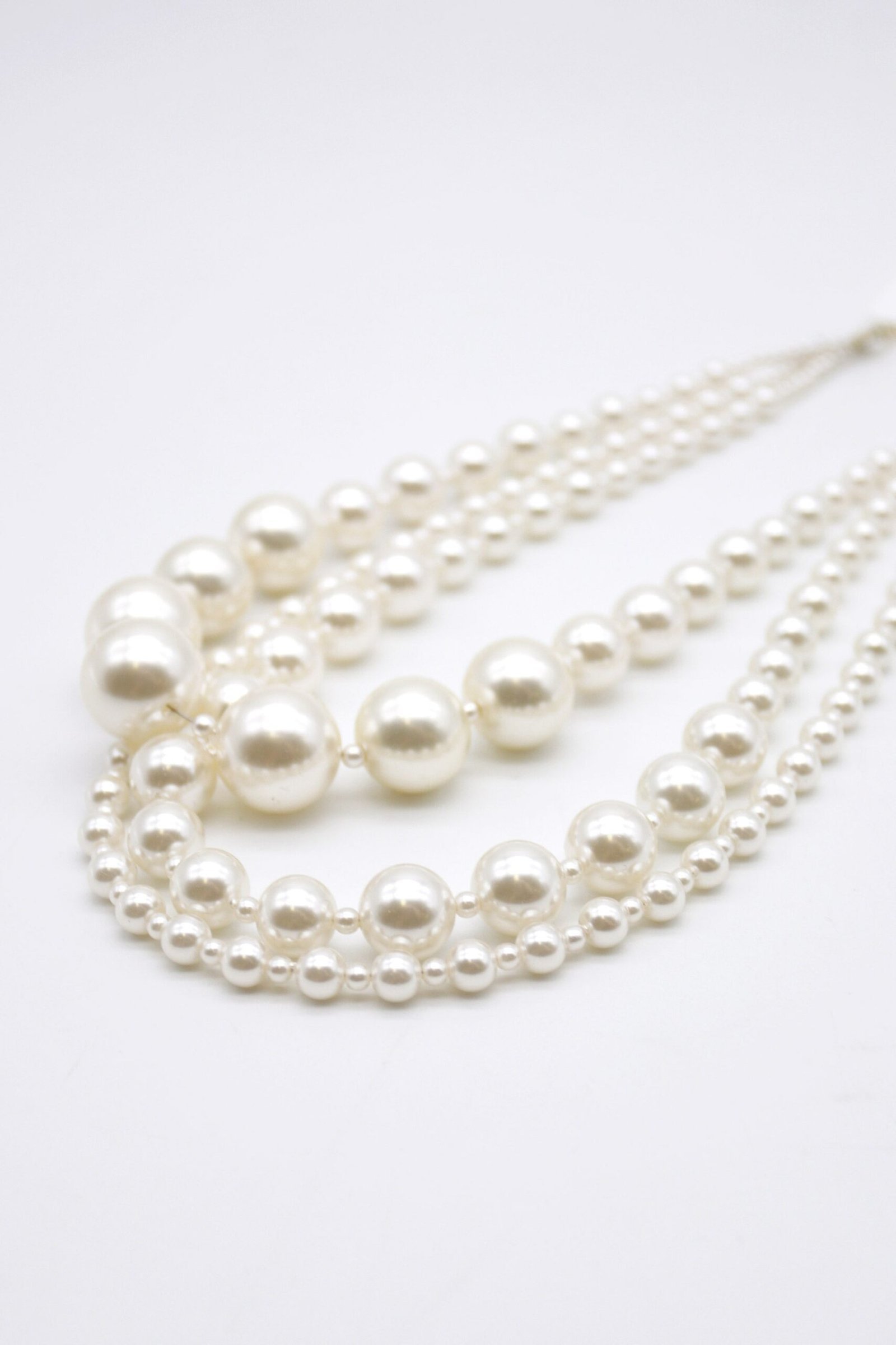 IMG_4791_7640cdcc-2e2d-49ef-83b4-bb47675d2707-scaled-1.jpg Layered Faux Pearl Necklace - Image 1