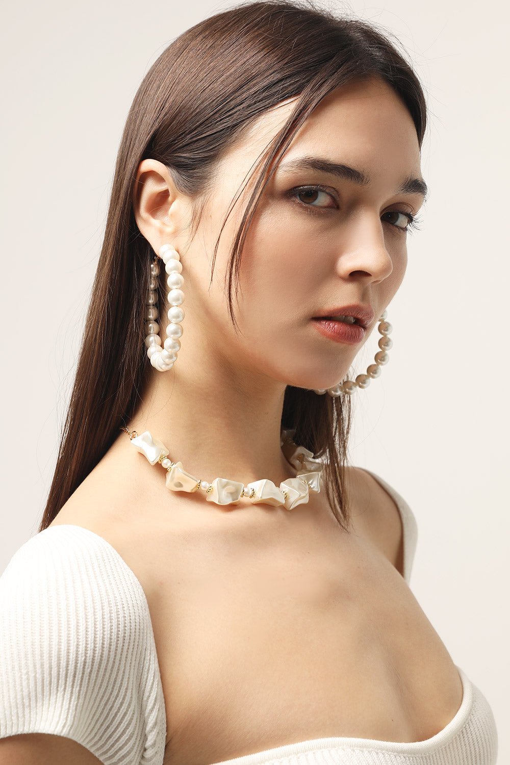 IMG_7858_ec355e6b-be6f-4c62-8eb8-cb653339d73a.jpg XL Faux Pearl Hoop Earrings - Image 1